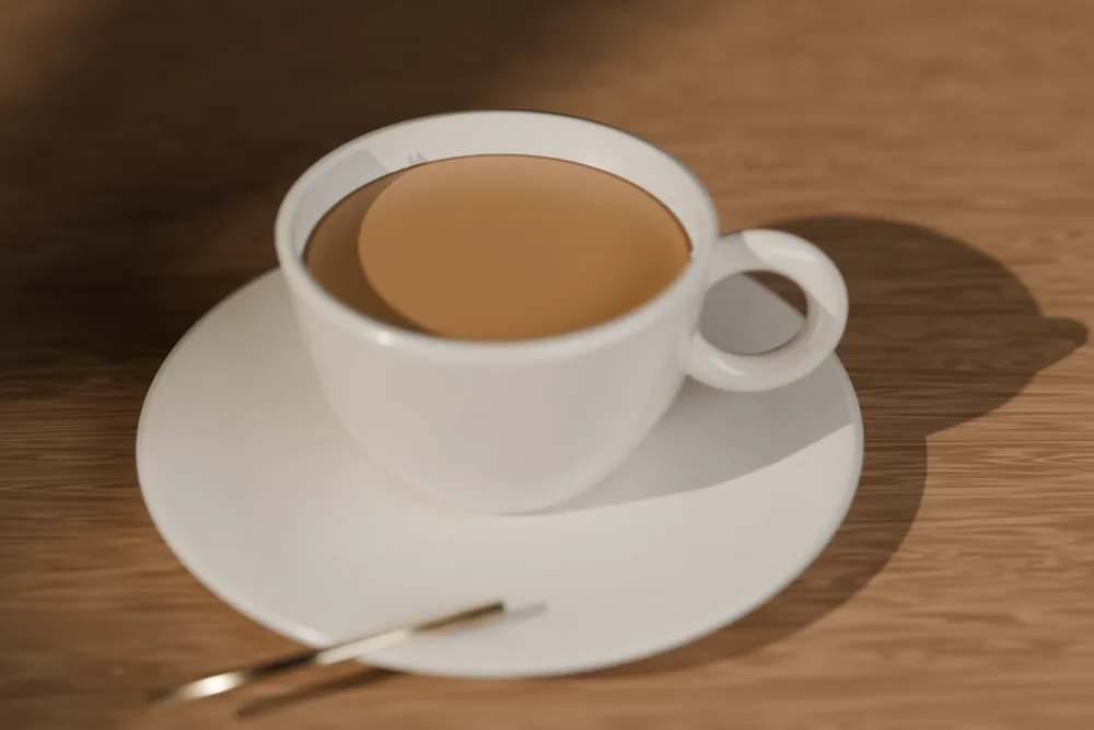 Café da Casa Brasa servido em xícara de cerâmica